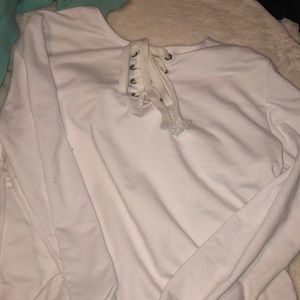 white sweatshirt with hockey laces